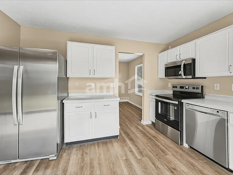 7317 Wellwood Dr — Photo 4