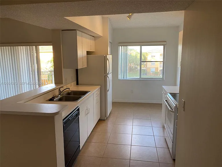 9645 NW 1st Ct #302 — Photo 8