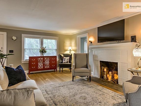 Charming living room with beautiful hardwood floors.