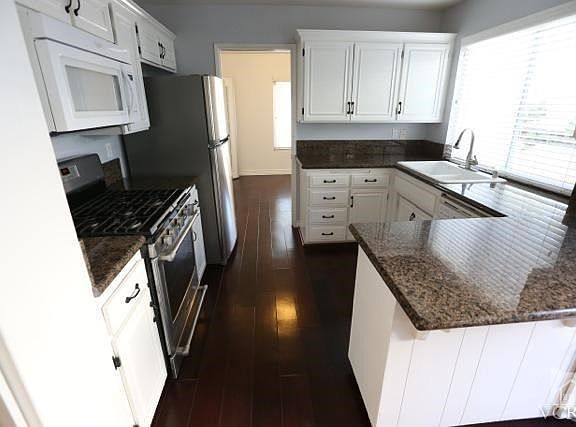 5th image of 909 Lindawood St