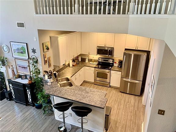 Lovely kitchen with under cabinet lighting.