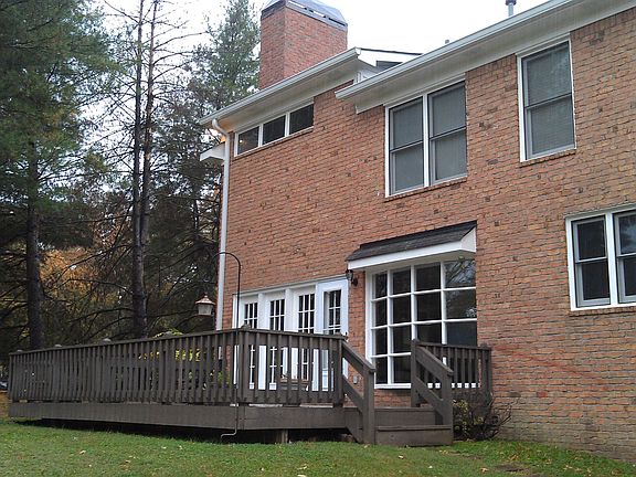 Back of house is all brick with a great deck.