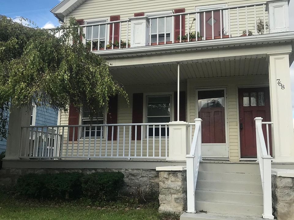 Front of House with Upper front porch