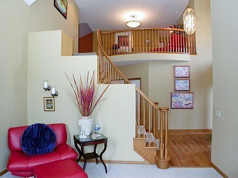 Living Room with view of upstairs Loft Hallway