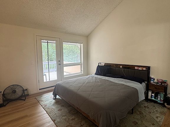 master bedroom with private balcony
