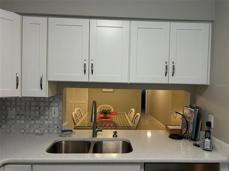 5662 Gardens Dr #104 — Photo 5