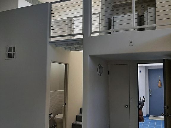 staircase and guest bath