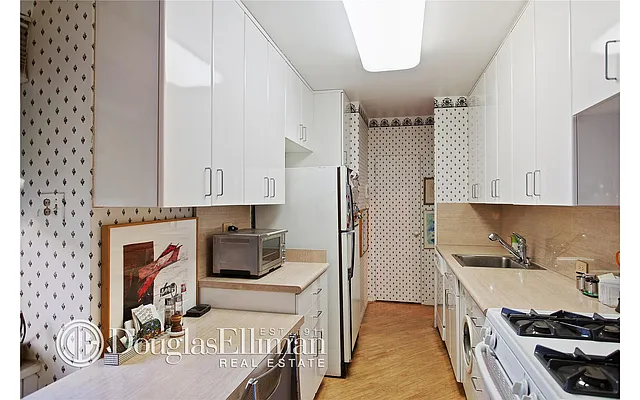 Sold by Douglas Elliman | media 16