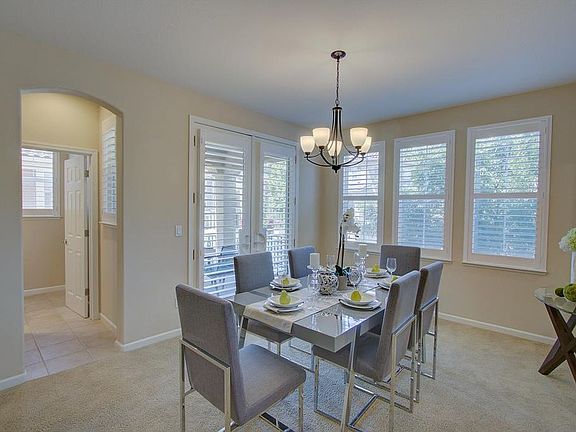 Dining & half bath (Note: no furniture provided, furniture in this pic is only for display)