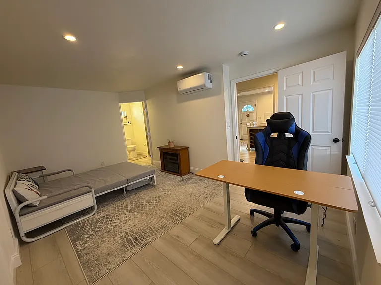 Bedroom en suite #2 with full-size sofa bed extended.