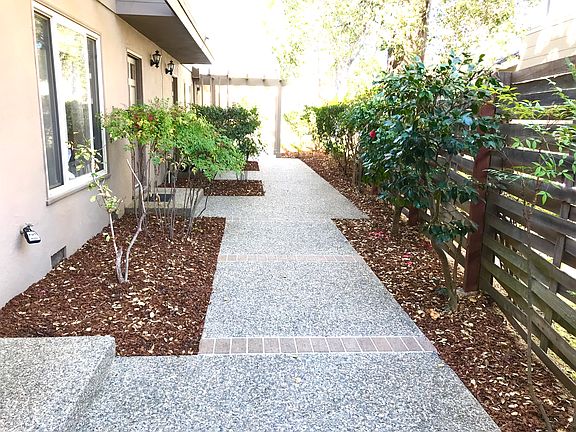 View of walkway from rear of the building looking toward the street.