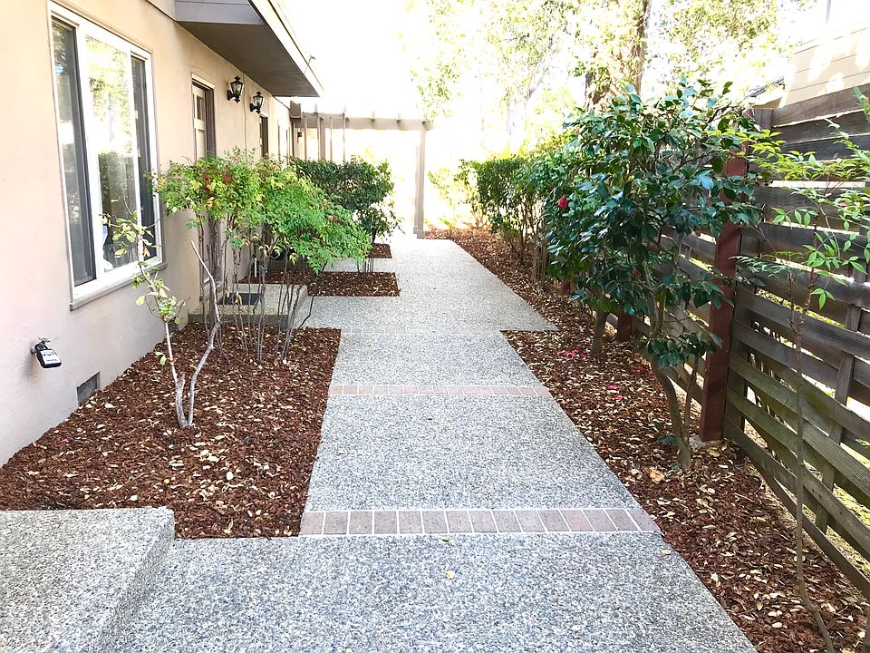 View of walkway from rear of the building looking toward the street.