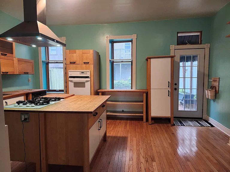 Kitchen is connected by a wide case opening from the living room. It has loads and loads of storage space for all your gadgets, pantry items, and more.