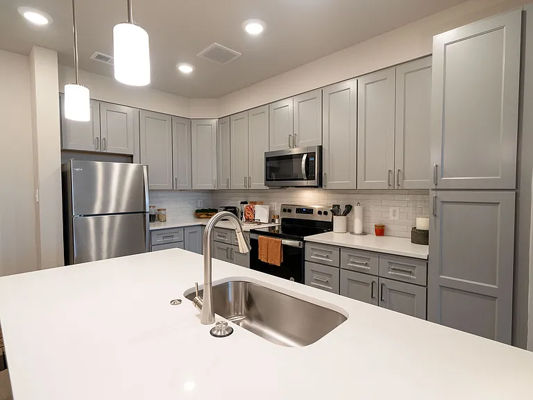 Kitchen with Island (Model 2BD/2BA Apt)