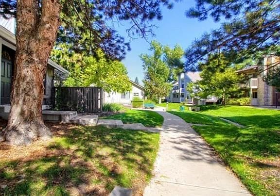 Walking path winds throughout adjoining neighborhoods. Beautifully manicured pet areas