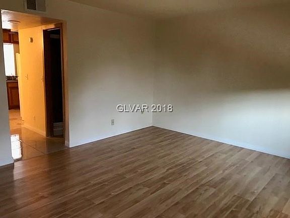The Living Room features laminate flooring.