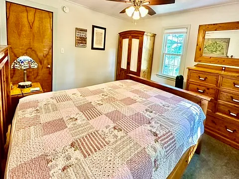 Comfortable mood lighting and ceiling fans are featured in each room.