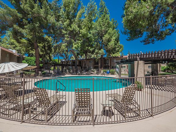 Main pool area in complex next to clubhouse with amenties