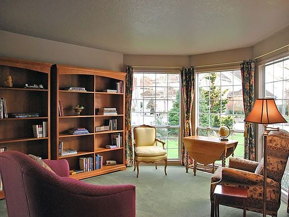 Lovely formal living room with Bay Window.