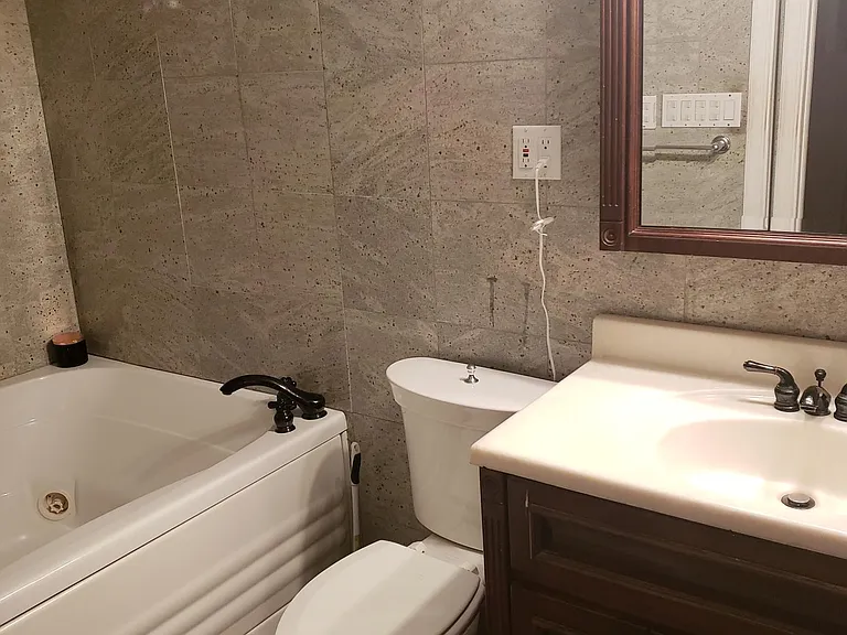 Master Bath With Jetted Jacuzi Tub