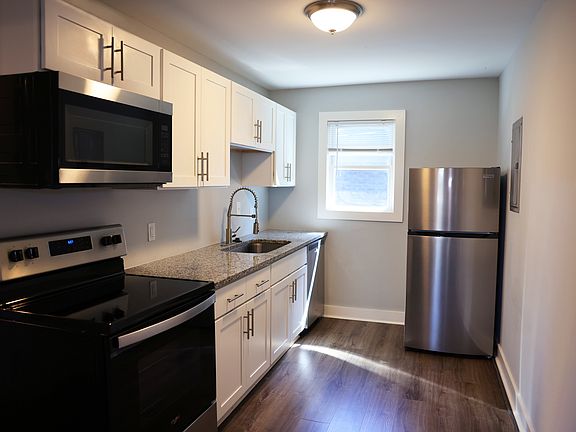 completely equipped kitchen with a lot of morning light.