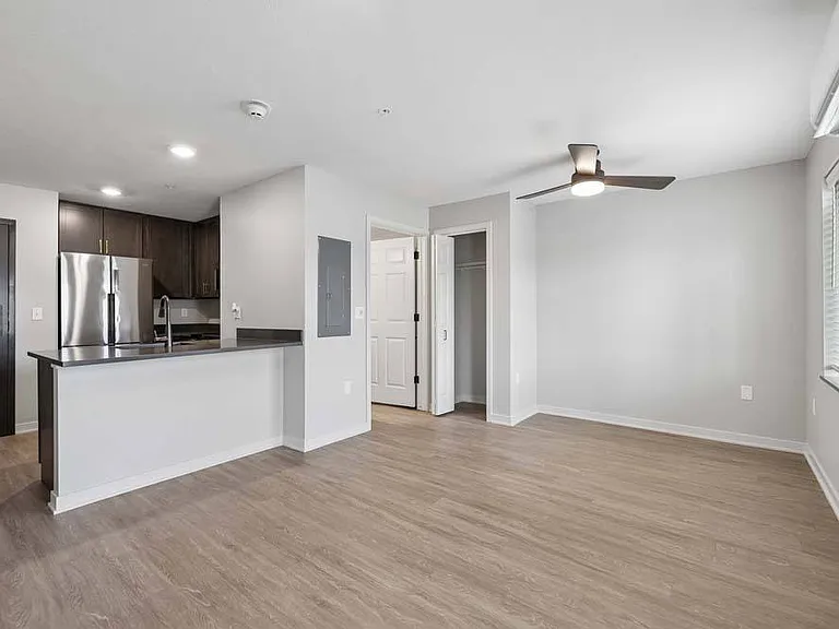 Expansive interiors and a seamless connection to the kitchen create a comfortable setting that's ready for both entertaining and everyday living.
