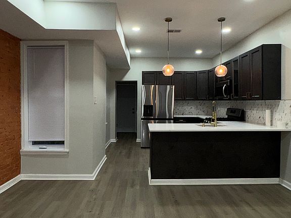 2nd image of 6152 Delancey St