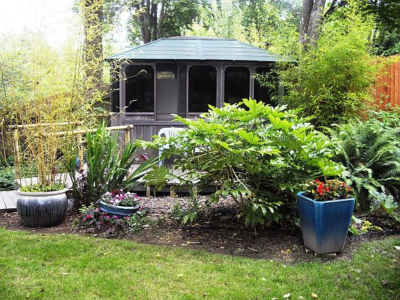 Private Gazebo hot tub w/sliding doors and domed roof.