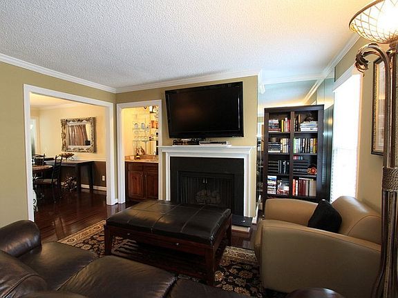 Gas fireplace in large living room.