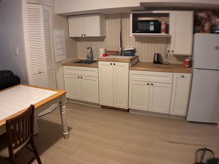 Downstairs kitchenette and dining area.