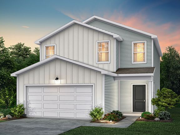Longspur Exterior TD102 features siding, covered front door and 2 car garage