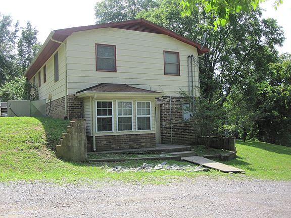 Side view of home and bay window.