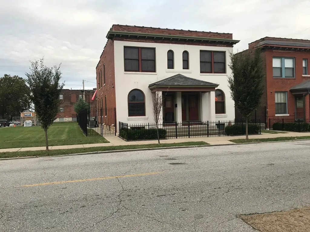 1121 Tower Grove is the townhome on the left, overlooking the grass lot. - 1121 Tower Grove Ave