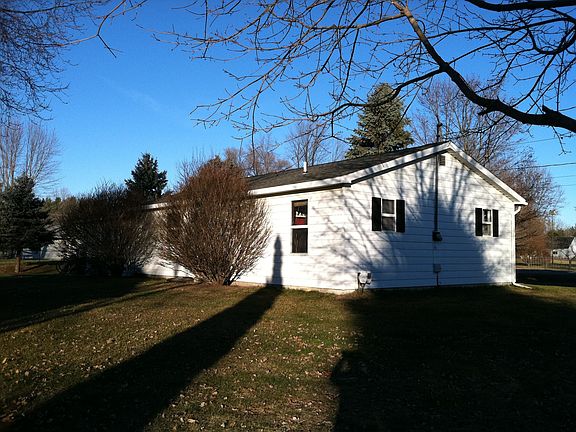 Spacious corner lot with mature trees.