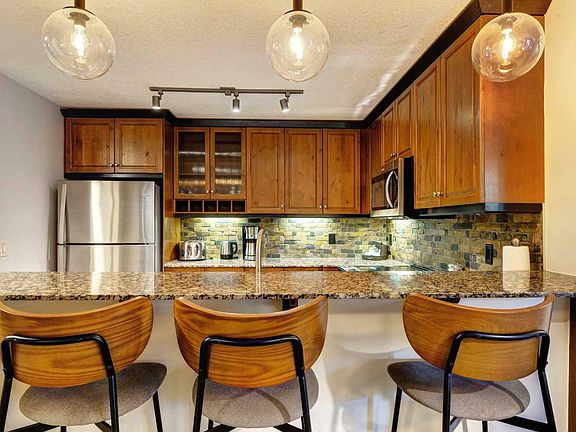 5th image of 113-170 Kananaskis Way #113