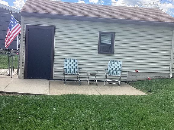 Patio next to garage