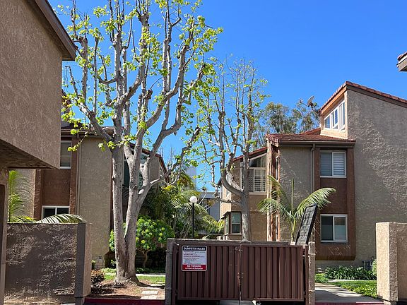 Carport parking in front of building