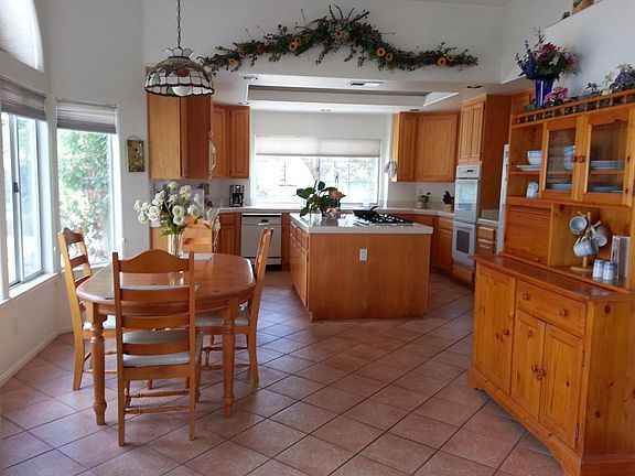 Bright beautiful large kitchen/dinette area. Walk in pantry (not visible in photo) double oven and 6 burner stove
