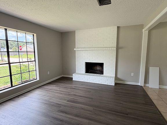 New Floors- Wood Burning Fireplace