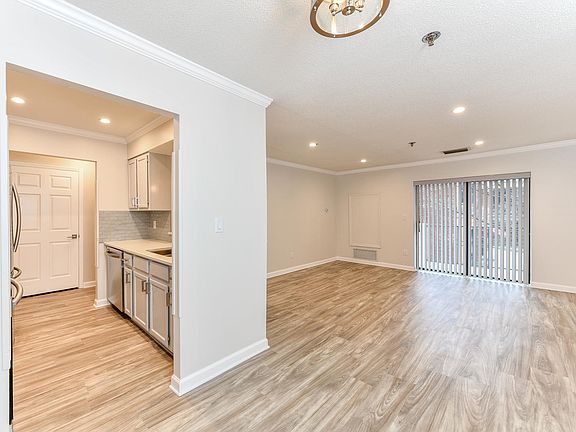 Recessed lighting in Kitchen and Living Room.