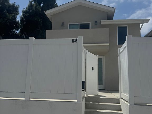 This photo is taken from street on 3rd. Privacy fence.