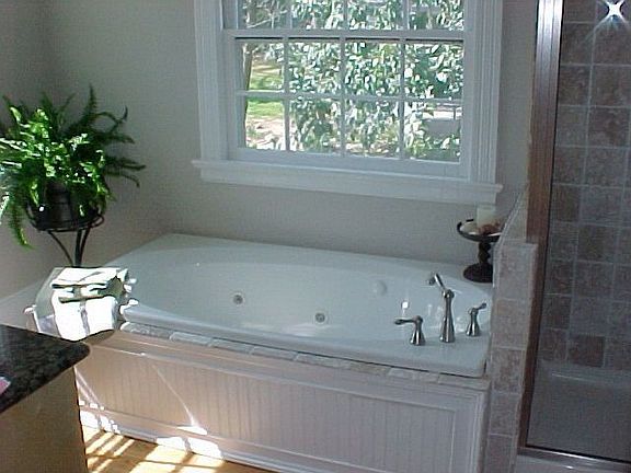 3 NEW BATHS, MASTER HAS WHIRLPOOL TUB AND SHOWER