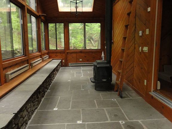 sunroom w/ woodstove