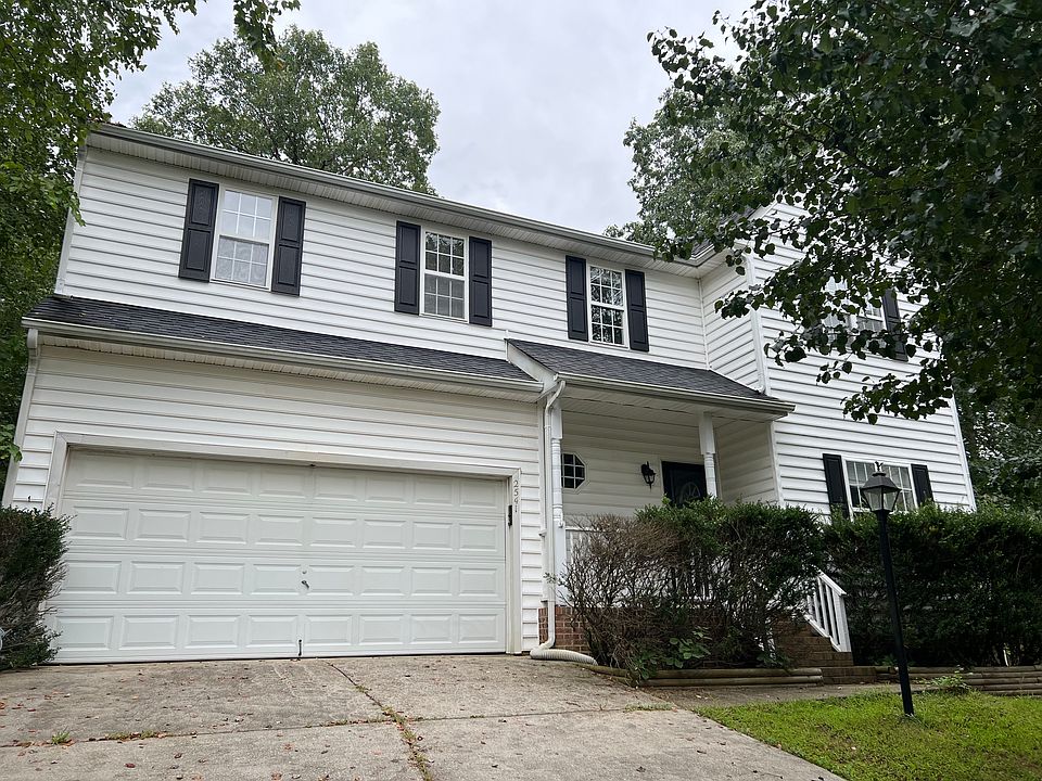 Exterior showing double car garage and main entrance