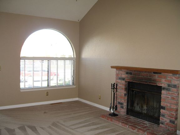 Living Room w/ Vaulted Ceiling