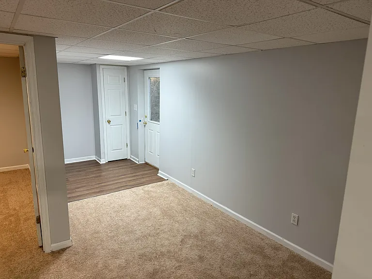 Extended rec room with walkout door