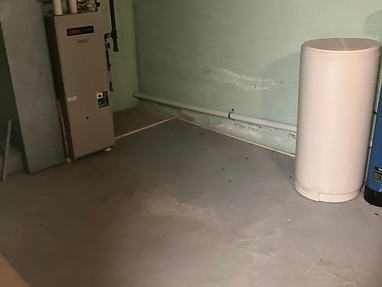 Utility area in basement. It is included in the lease that the tenant must purchase and keep salt in the water softener.