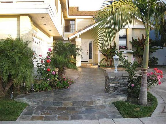Slate tiled walkway in afternoon 