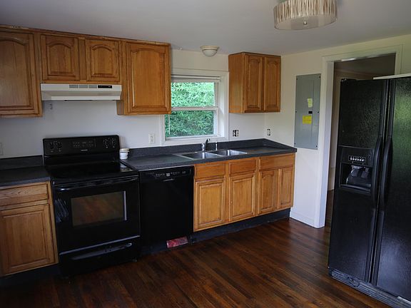 Dishwasher and fridge have been replaced since this photo