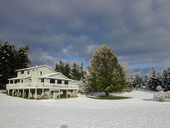 Winter view home, barn, lot
